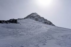 03B We Take A Final Rest With Mount Vinson Summit Ridge Above On Mount Vinson Summit Day.jpg